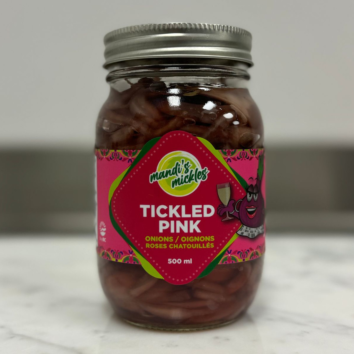 A jar of Tickled Pink from Mandi's Mickles